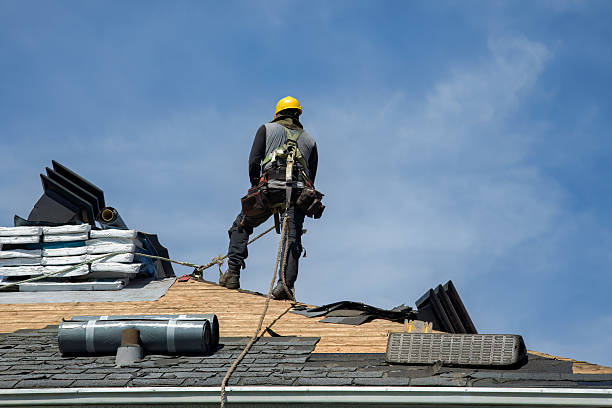 Professional Roof Replacement technician working in Eastport, ME